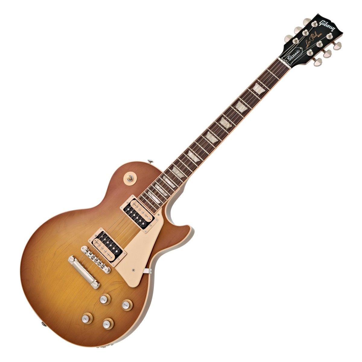 En bild på Gibson Les Paul Classic Honeyburst | Du vet redan. Les Paul är en legend. Denna Gibson Les Paul Classic är ännu en reason till att denna legend kommer att fortsätta att leva i kommande generationer. Den har utformats med gitarrens arv i åtanke och levererar den ikoniska Gibson-ton i en snygg modell som utseende som om den kom direkt från 60-talet och landade på 2000-talet redo att rocka och rulla.   Den känns fantastiskt i dina händer. Eftersom det inte finns något riktigt som det äkta rosenträ greppbräda för att ge smidig spelbarhet. Dessutom har du all den kraft och mångsidighet du förväntar dig av en Les Paul. Och mer. Burstbucker open-coil pickuper låter dig spränga varje ton med hög volym - utan återkoppling. De ger dig också en mängd tonalternativ tack vare spolning- och fasbyte. Det är inte mycket den här gitarren inte ger dig. Upplev geniet i den klassiska Les Paul.