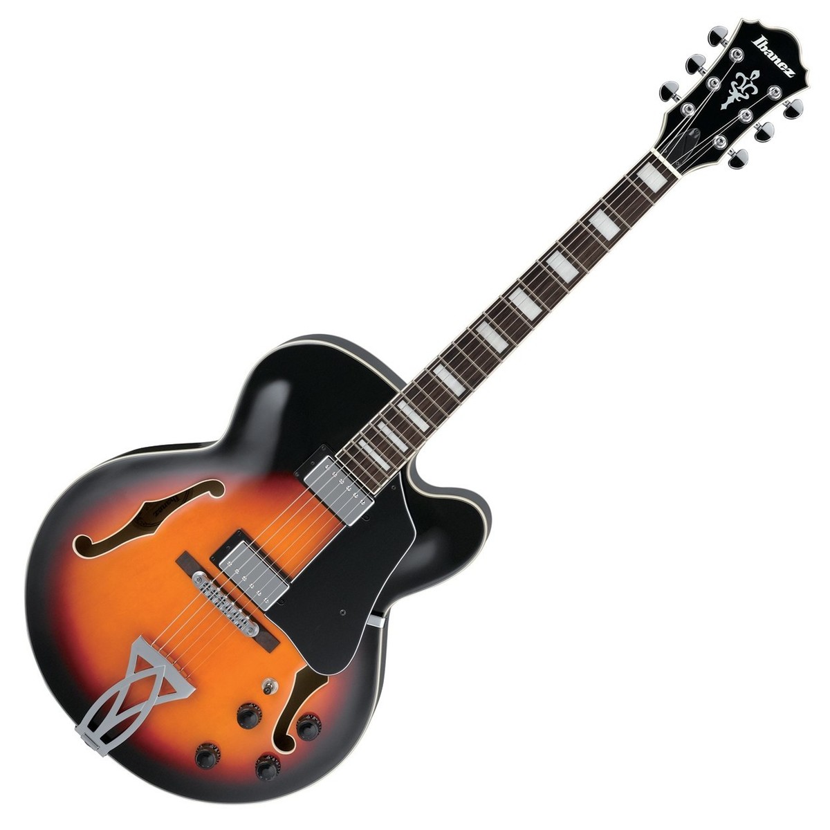 En bild på Ibanez AF75 Artcore Brown Sunburst | Ibanez AF75 Artcore passar bra för att spela klassisk rock blues och jazz och mycket annat. Denna vintageinspirerade gitarr har både klass och elegans. Med en ihålig konstruktion låter den dig spela ljusa och öppna toner i en mängd olika genrer och spelstilar. Detta är ett stycke musikalisk skönhet som kommer att imponera på dig med sin mångsidighet och enkla spelbarhet.   Två klassiska Elite Ibanez humbucker sitter tvärs över gitarrens kropp och ligger bakom de läckert feta bastonerna. Du kan spela ackord med ett krämigt texturellt djup tack vare dessa minutiöst designade pickuper. På tal om resonans greppbrädan i rosenträ ger dig en utmärkt respons en mjuk touch och en härlig plattform för ditt spelande. Underbart detaljerade f-hål kompletterar den tidlösa estetiken hos AF75 och gör den till ett instrument som kommer att förbättra ljudet för alla musiker.