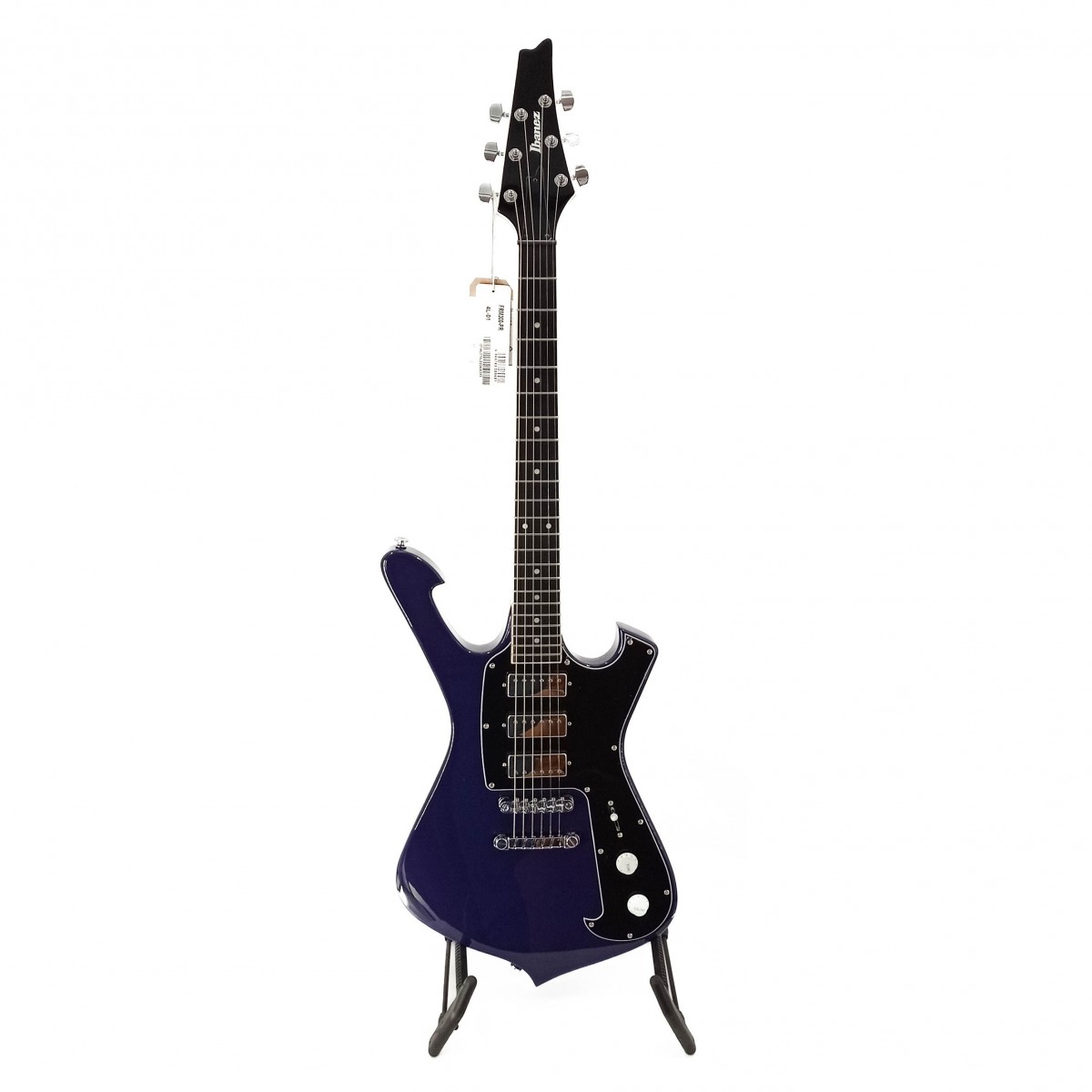 En bild på Ibanez FRM300 Paul Gilbert Fireman Purple - Ex Demo | Ibanez FRM300 Paul Gilbert Fireman behöver ingen introduktion. Från det första ögonblicket är dess bländande skönhet och slående närvaro uppenbar och det är ingen överraskning att det har fått officiellt godkännande av Mr. Bigs grundare. Utforska Paul GIlberts ikoniska toner med tre DiMarzio humbuckers som har speciellt lindats enligt Pauls specifikationer för att ge ett autentiskt ljud. Och när du tappar all känsla för tid och rum under alla dina spännande solon har du den fantastiskt stabila stämningen som Gibraltar Performer-Stallet erbjuder på din sida.   En stark och extremt hållbar okoume-kropp kompletteras med en jämn och slät lönn / okoume-hals som ger dig enastående spelbarhet. Eftersom den bekväma halsen sitter enkelt i din hand kommer dina fingrar att kunna valsa sömlöst över den bundna ebenholts greppnbrädan med vita prickinlägg. Varje ton kommer att flyga från strängarna med magisk sustain skarp attack och oslagbar klarhet. För att garantera att du får en livstid att spela på detta instrument ingår en väska. Res från gigg till gigg eller till studion och var säker på att din gitarr inte skadas. Ex-Demo: Denna produkt kan vara ex-display ha mindre tecken på användning eller lätta ytliga skråmor och sakna icke-nödvändiga delar. Originallåda paketering eller manual kanske inte ingår. Varje föremål kontrolleras av vårt team av reparationstekniker för att försäkra att det möter våra höga standarder. Detta är en fantastisk möjlighet att köpa en fullt fungerande produkt till ett nedsatt pris.