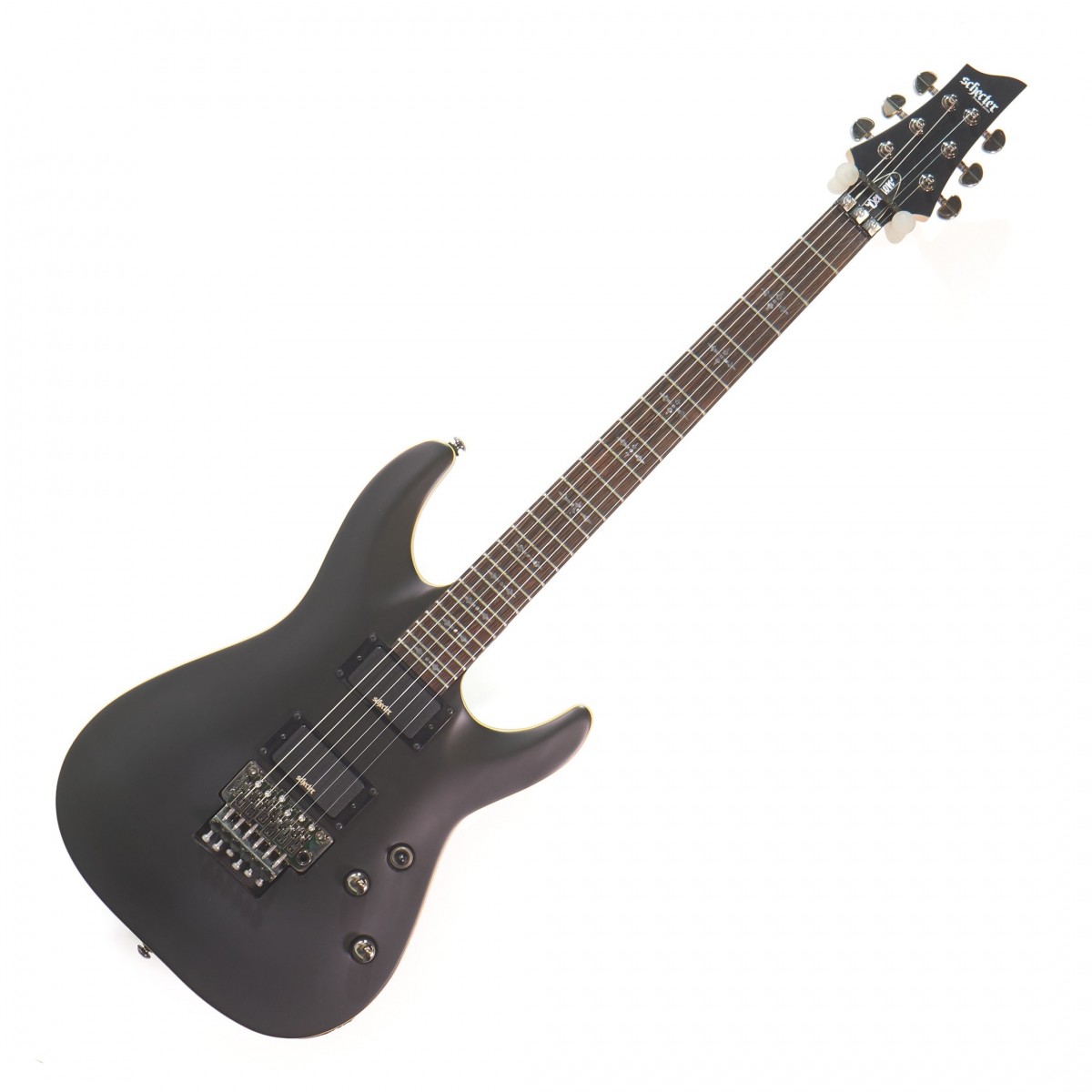 En bild på Schecter Demon-6 FR Satin Black - F.d. utställningsmodell | Schecter Demon 6 FR har en bekväm dubbel-cutaway basswoodkropp med en lönnhals och Wenge greppbräda för utmärkt spelbarhet. Skapa tunga rocktoner med Seymour Duncan Design HB-105 aktiva pickuper som finns på denna mångsidiga gitarr. Schecter har också ett Floyd Rose specialtremolysystem för att skapa otroliga stigböjningar och dive bombs.Ex-Demo: Denna produkt kan vara ex-display ha mindre tecken på användning eller lätta ytliga skråmor. Originallådan eller paketeringen kanske inte ingår. Varje objekt har kontrollerats av vårt team av reparationstekniker för att försäkra att det möter våra höga standarder. Detta är en fantastisk möjlighet att köpa en fullt fungerande produkt till ett nedsatt pris.