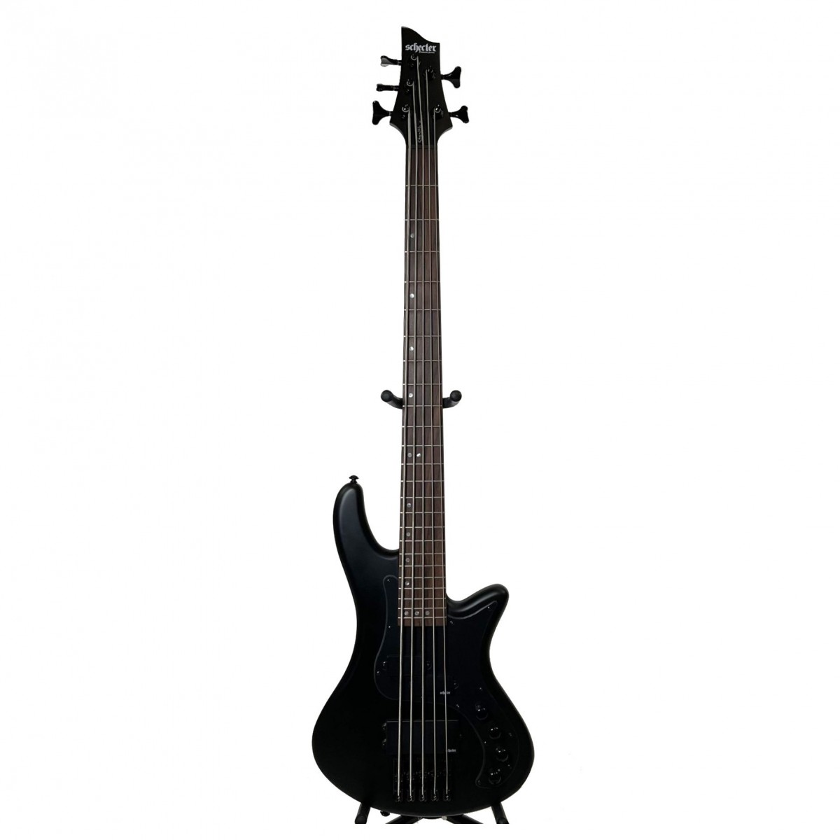 En bild på Schecter Stiletto Stealth-5 Basgitarr Satin Black - F.d. utställningsmodell | Schecter Stiletto Stealth-5 Basgitarr erbjuder en rad tonal möjligheter tack vare Diamond P och SuperRock MM pickuper. Med en mastervolym och tonkontroll är Schecter ansluten med en 2-bands EQ som erbjuder snabba tonjusteringar för att få det perfekta ljudet. Dess basswood-kropp ger en otroligt dynamisk och definierad ton medan lönnhalsen är kopplad med en rosenträ greppbräda för att ge ljusa egenskaper. Även med Schecter Stämskruvar ett S-Tek stall och svart hårdvara är Schecter Stealth avslutade med en satin black finish vilket skapar en komplett svart utseende som kommer att återspegla att mörka toner som den producerar.Ex-Demo: Denna produkt kan vara ex-display ha mindre tecken på användning eller lätta ytliga skråmor. Originallådan eller paketeringen kanske inte ingår. Varje objekt har kontrollerats av vårt team av reparationstekniker för att försäkra att det möter våra höga standarder. Detta är en fantastisk möjlighet att köpa en fullt fungerande produkt till ett nedsatt pris.