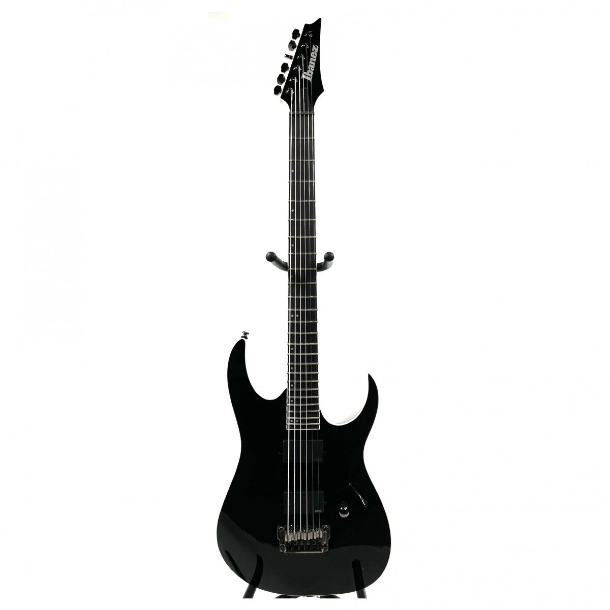En bild på Ibanez RGIB21 Iron Label Baritone Black - Ex Demo | Skapa en överväldigande dundrande metallton. Ibanez Iron Label series har kommit ända in i jordens kärna för att släppa en inspirerande ny serie gitarrer. Ibanez RGIB21 Iron Label Baritone bringar fram helvetets änglar med en 28" skala som ger en full och rik ton som du omedelbart kommer att bli förälskad i. Fortsatt kalla på magi för perfekt spelbarhet. Nitro Baritonhalsen så gott som smälter samman med greppbrädan i jatoba och erbjuder ett underbart basregister med ett fint snabbt gensvar. Är du redo för pickuper som skulle få djävulen själv att gråta? RGIB21 omfattar EMG 60 och en EMG 81 pickuper som båda erbjuder en ren metallton. EMG 60 ger den släta eleganta och solida tonen som är grunden för alla fantastiska metallgitarrer. EMG-81 mickarna erbjuder ett skinande diskantregister vilket garanterar att varje ton resonerar och sjuder ut sustain ända in på det kommande decenniet. Skapa en perfekt atmosfär på scenen men uppträd ändå hur lätt som helst. De självlysande sidopunktsinläggen kommer att belysa vägen för metall i självaste mörkrets furstes anda. Ex-Demo: Denna produkt kan vara ex-display ha mindre tecken på användning eller lätta ytliga skråmor och sakna icke-nödvändiga delar. Originallåda paketering eller manual kanske inte ingår. Varje föremål kontrolleras av vårt team av reparationstekniker för att försäkra att det möter våra höga standarder. Detta är en fantastisk möjlighet att köpa en fullt fungerande produkt till ett nedsatt pris.