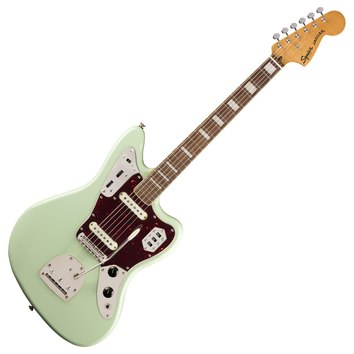 En bild på Squier Classic Vibe 70s Jaguar Surf Green | Squier Classic Vibe 70s Jaguar är en gitarr som stoltserar med oklanderlig klarhet och ger en otrolig vintage vilket gör den till ett eftertraktat och eftertraktat instrument. Jaguar är utrustad med en uppsättning Fender-designad enkelspoliga pickuper och avger ett ljud som injicerar varje nyans med det nödvändiga bettet. Kopplad till en uppsättning mångsidiga kontroller kan du aktivera separata lednings- och rytmkretsar. Classic Vibe kommer med ett överflöd av hårdvara som lyfter den vintage med en önskvärd icke-låsande flytande vibratostall. Ett fantastiskt spelbart instrument Squier Classic vibe är en sann återgivning av den ikoniska Jaguar-känslan.